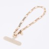 Uniq COEHL Goldilocks Charm Handstrap подвеска для телефона из бронзы, Champagne Gold